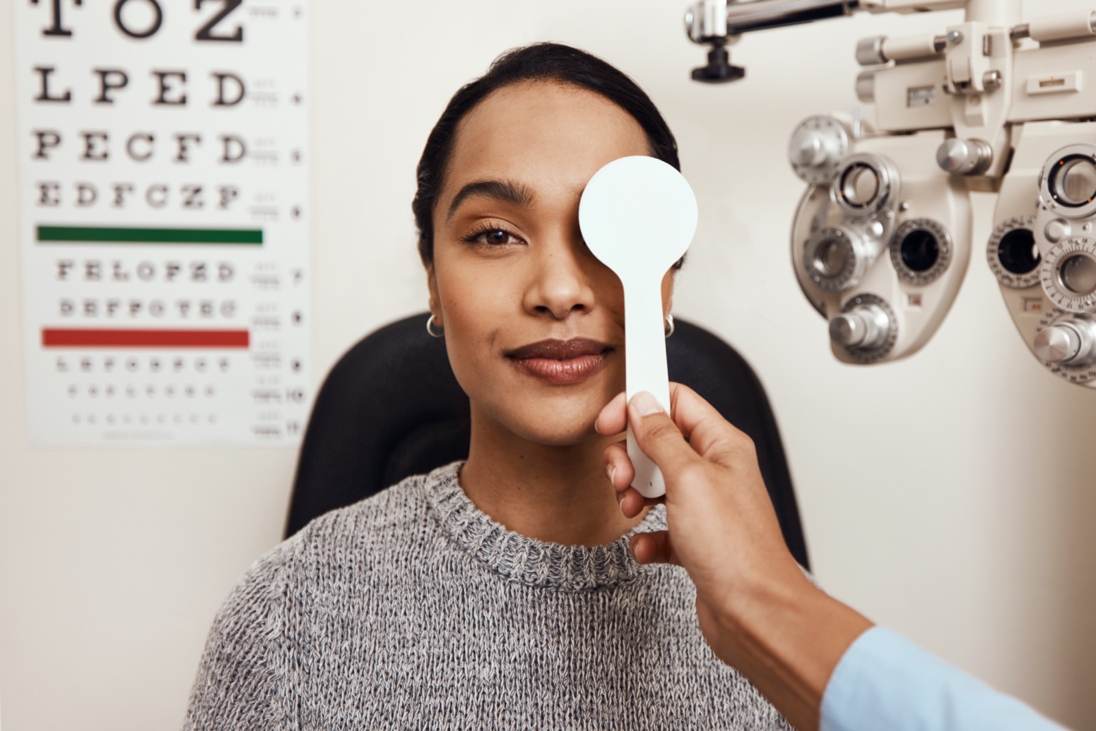 Patient having her vision checked during a comprehensive eye exam at Arbor Eyecare